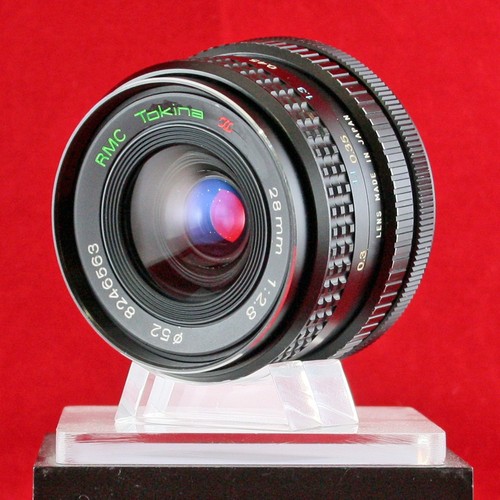 Obiettivo tokina rmc - **obiettivo,